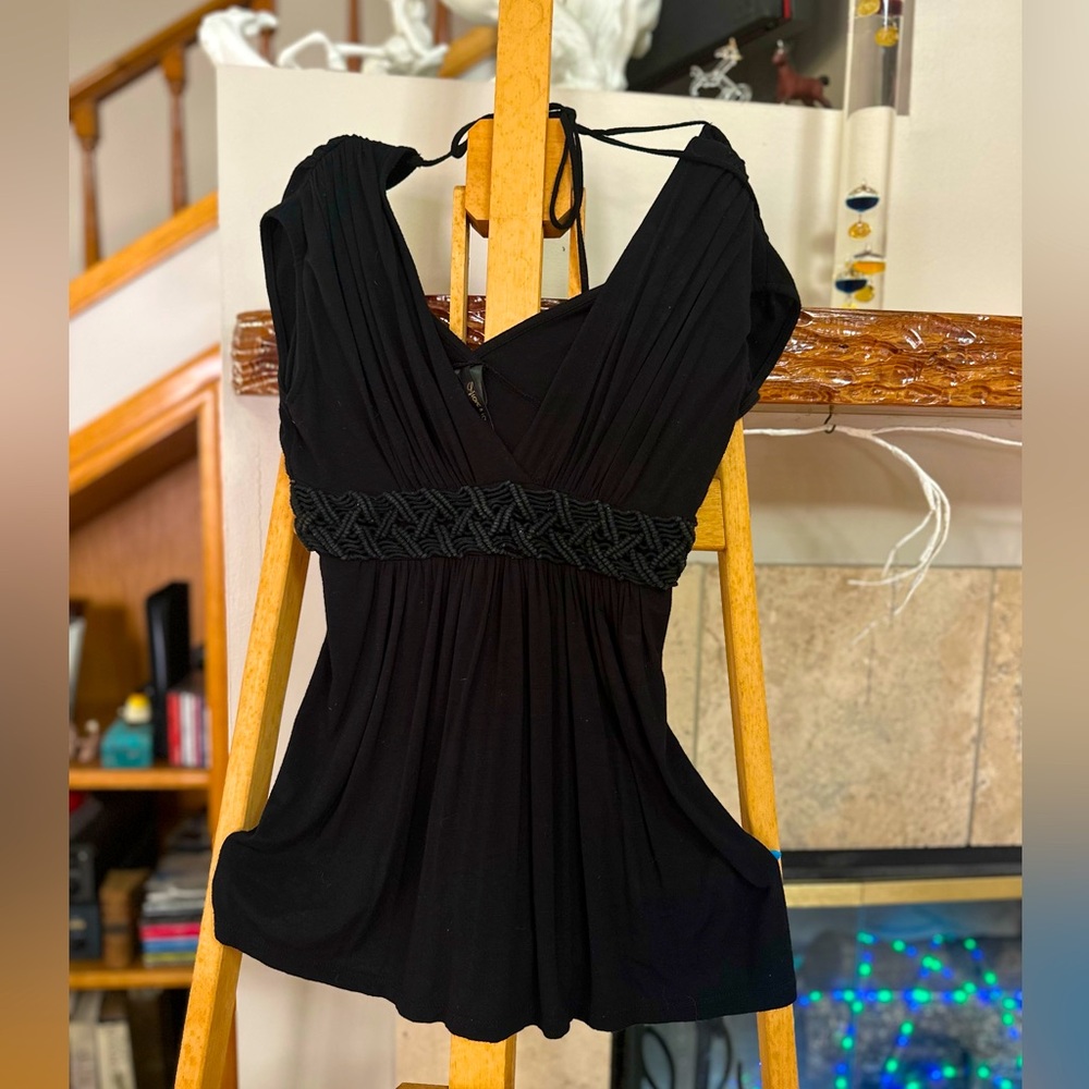 Plunging neck and back with a simple tie in the back